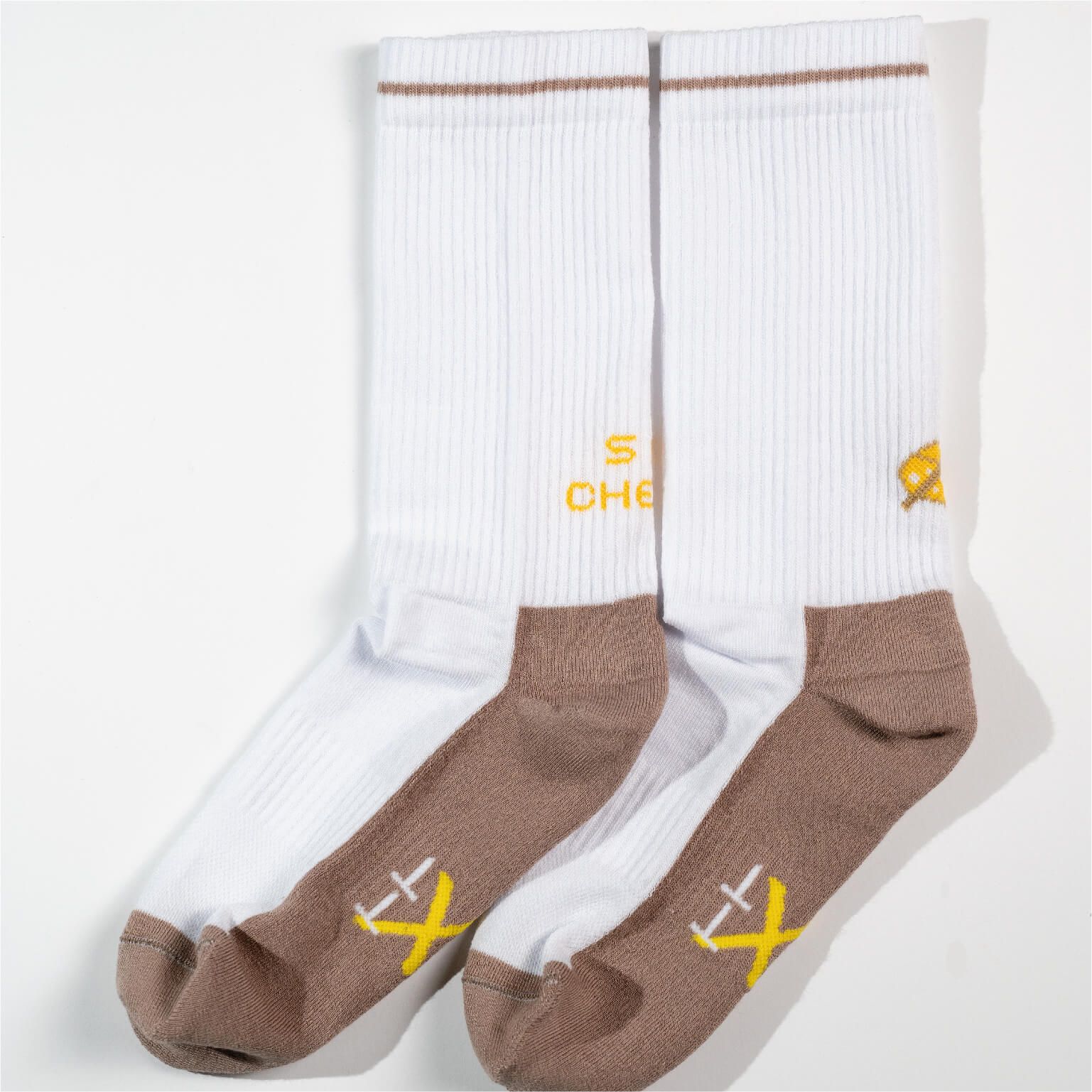 cheese socks laying sideways on the ground